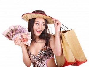 13259036-happy-woman-with-money-and-shopping-bag